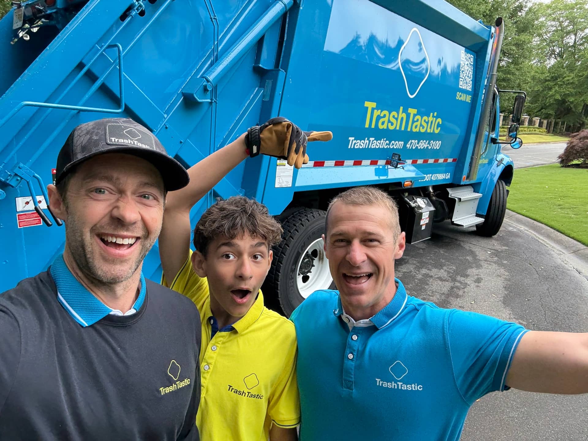 TrashTastic team in action - fun photo with truck